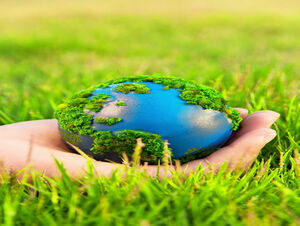 Hand holding blue earth environmental protection ppt template