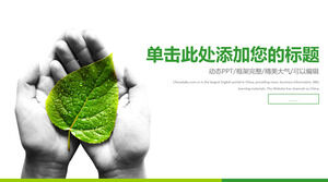環境PPTテンプレートを保護するために緑の葉を持っている手