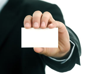 商務人士拿著白板空白卡高清圖片素材（10張）